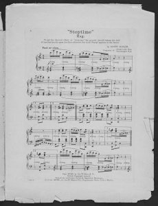 Sheet music. The title "'Stoptime' Rag" is at the top, followed by a short description: "To get the desired effect of 'Stoptime' the pianist should stamp the heel of one foot heavily upon the floor, wherever the word 'Stamp' appears in the music." Under this description, the words "by Scott Joplin, Composer of Gladionlus Rag, Searchlight Rag" are on the right side. There are five lines of music on the page, and the word "stamp" is scattered throughout. The song is in a 2/4 time signature, and the descriptor "Fast or slow" is above the music.