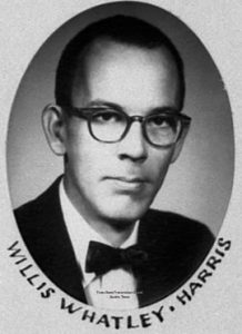 Close-up of Willis Whatley looking at the camera. The words "Willis Whatley - Harris" are curved beneath the ovular portrait.