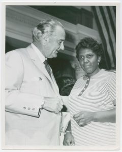 Barbara Jordan standing next to President Lyndon B. Johnson.