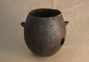 Round brown-black vessel with handles