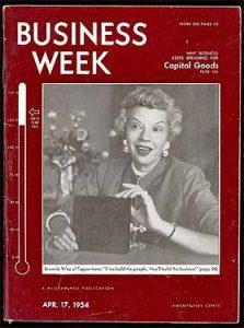 Grayscale photo of white woman in business attire on magazine cover with burgundy border
