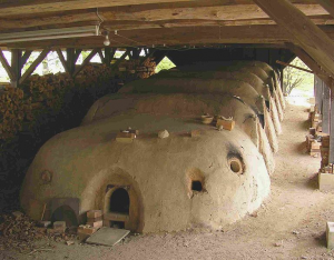 Multiple kilns under wooden roof covering