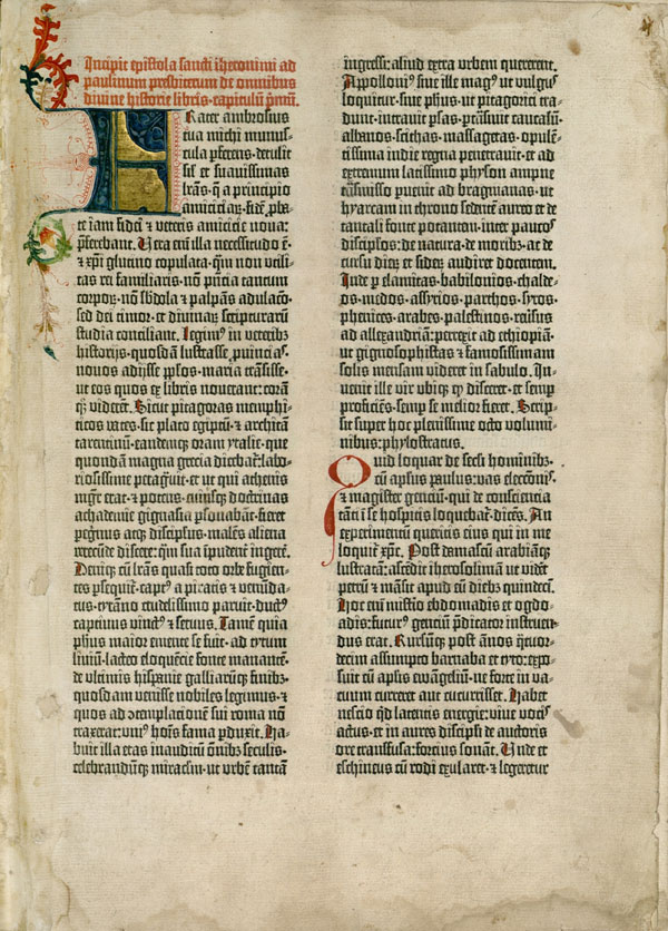 Ornate manuscript page with two columns of text starting with red, blue, and gold embellished text