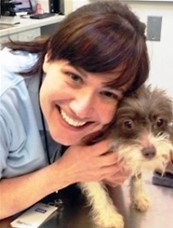 Portrait of Dr. cate McManus and dog