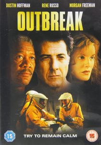 Flyer for the 1995 movie “Outbreak” showing the faces of Dustin Hoffman, Rene Russo, and Morgan Freeman and a scene where they are dressed in hazmat suits