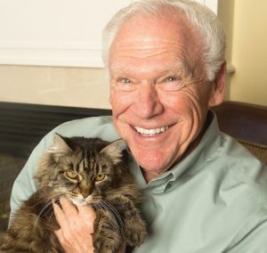 Headshot portrait of Rich Avanzino with a cat
