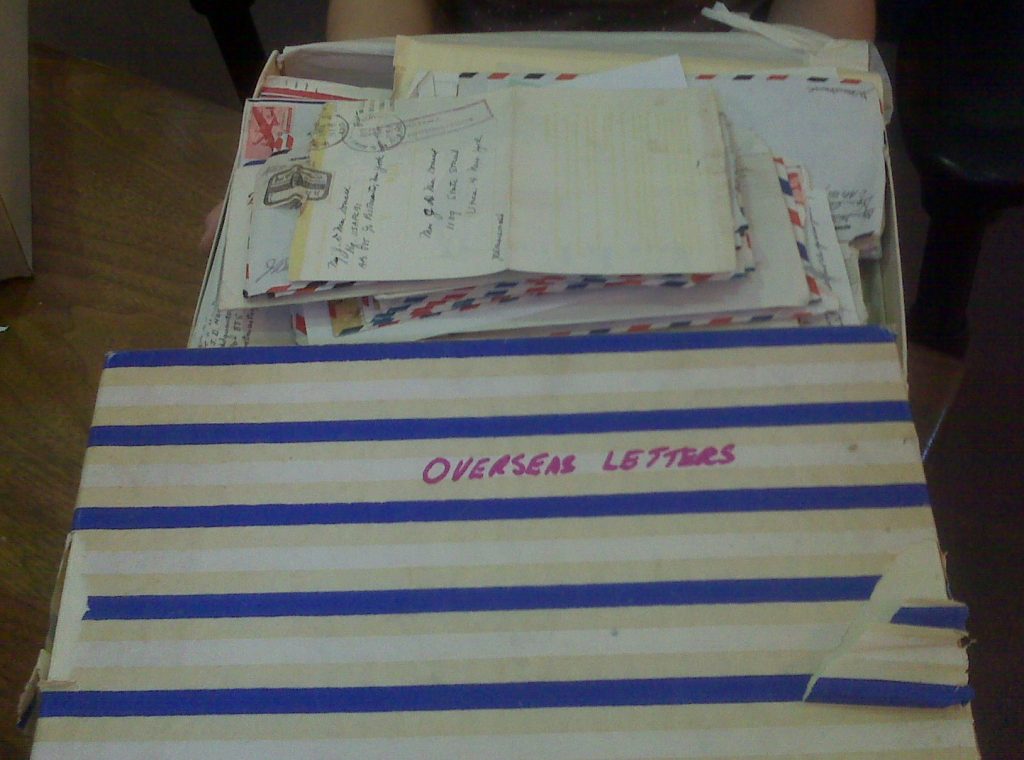 An assortment of correspondence between Dorothy and John; text on a folder reads "Overseas Letters"